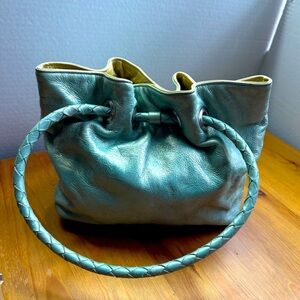 Susan Farber Collections turquoise bag with signature leather vintage